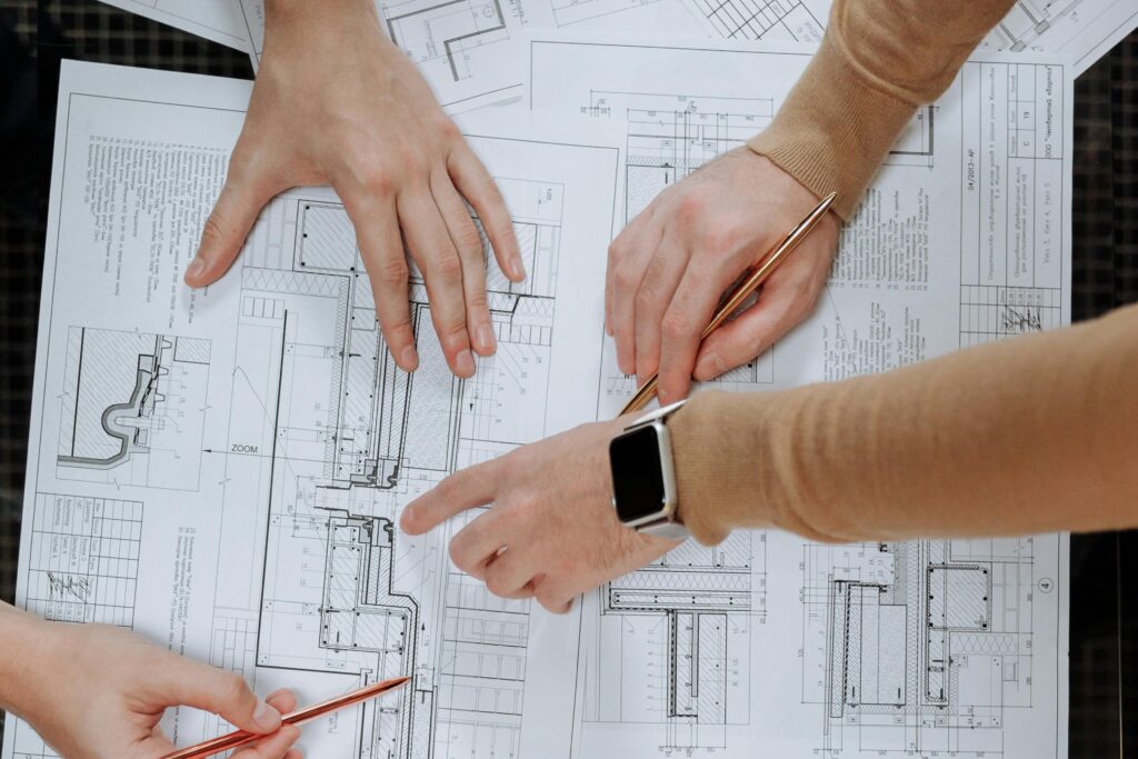 Team working together on blueprints